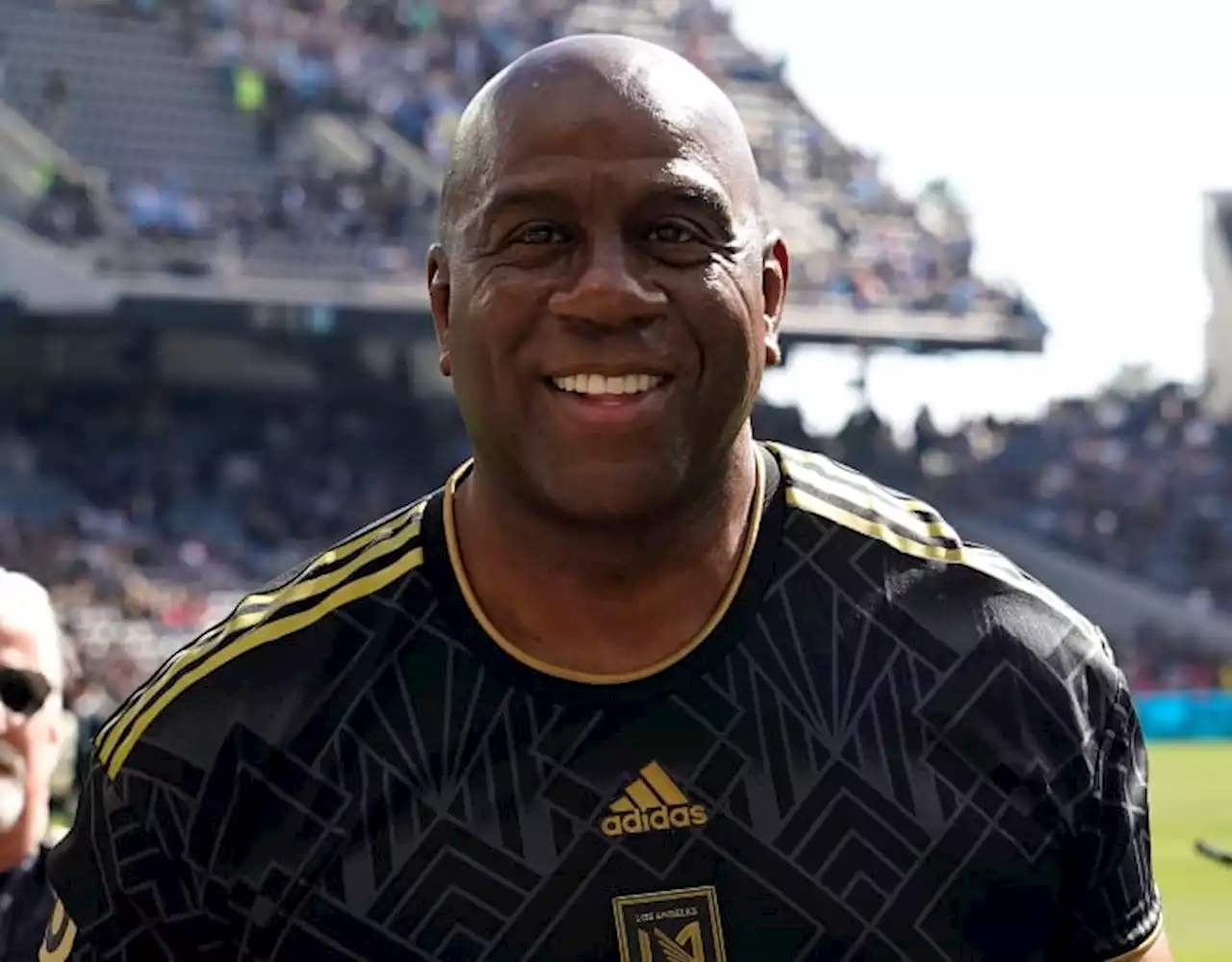 AP source: Magic Johnson joins Harris' bid for Commanders