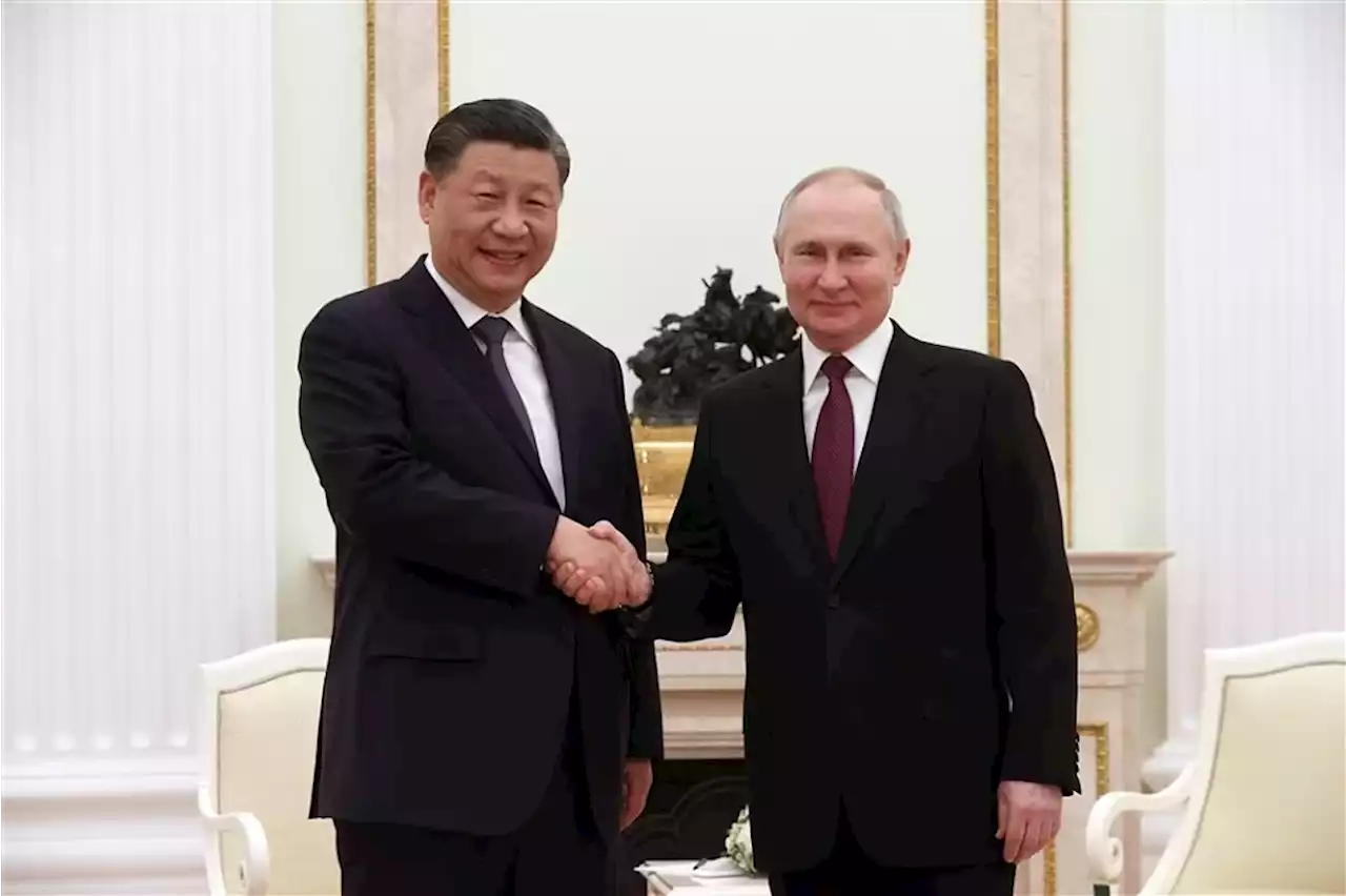 Xi calls Russia ties priority on Moscow trip