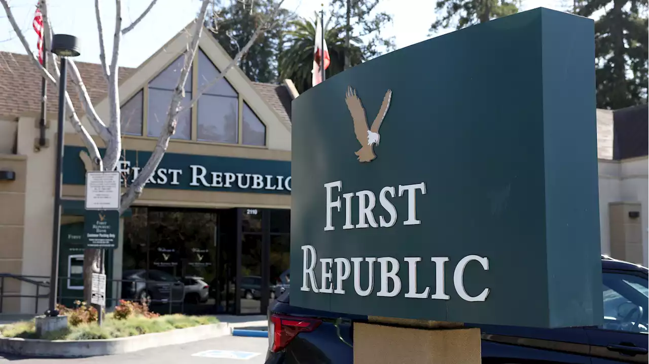 First Republic Bank shares sink to another record low, but stock markets are calmer