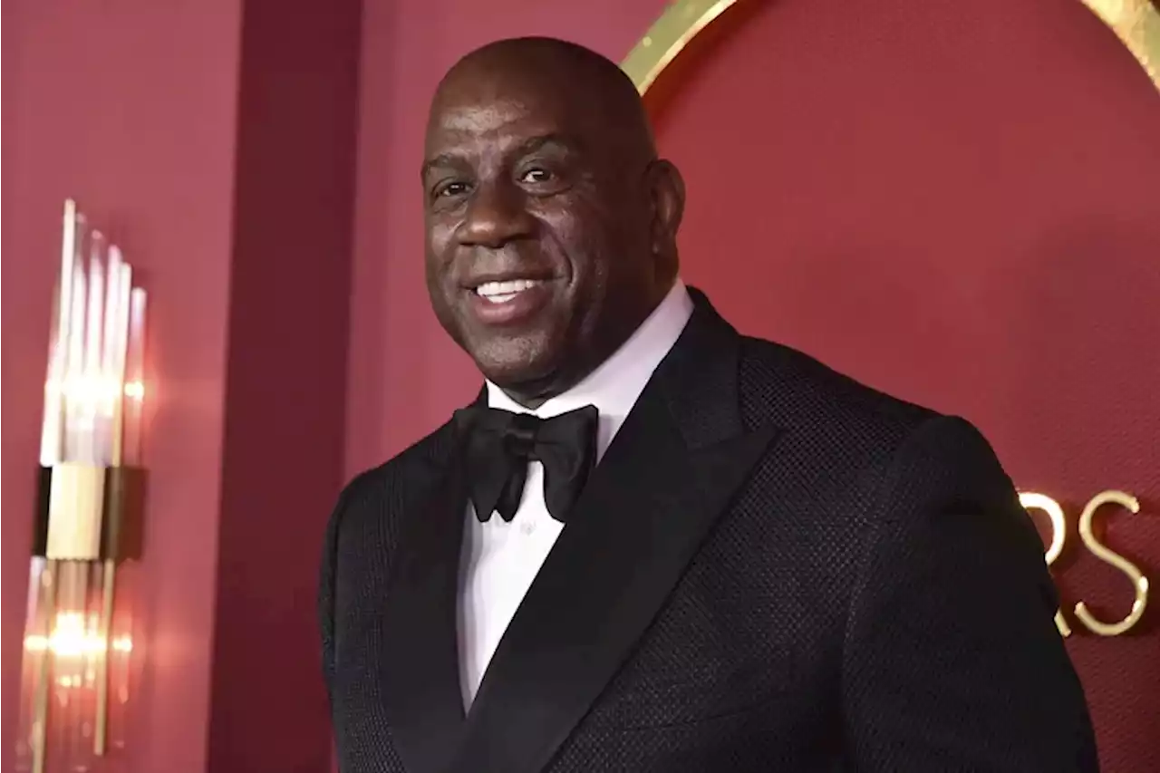 Magic Johnson joins Sixers owner Josh Harris’ group in bid to buy the NFL’s Washington Commanders