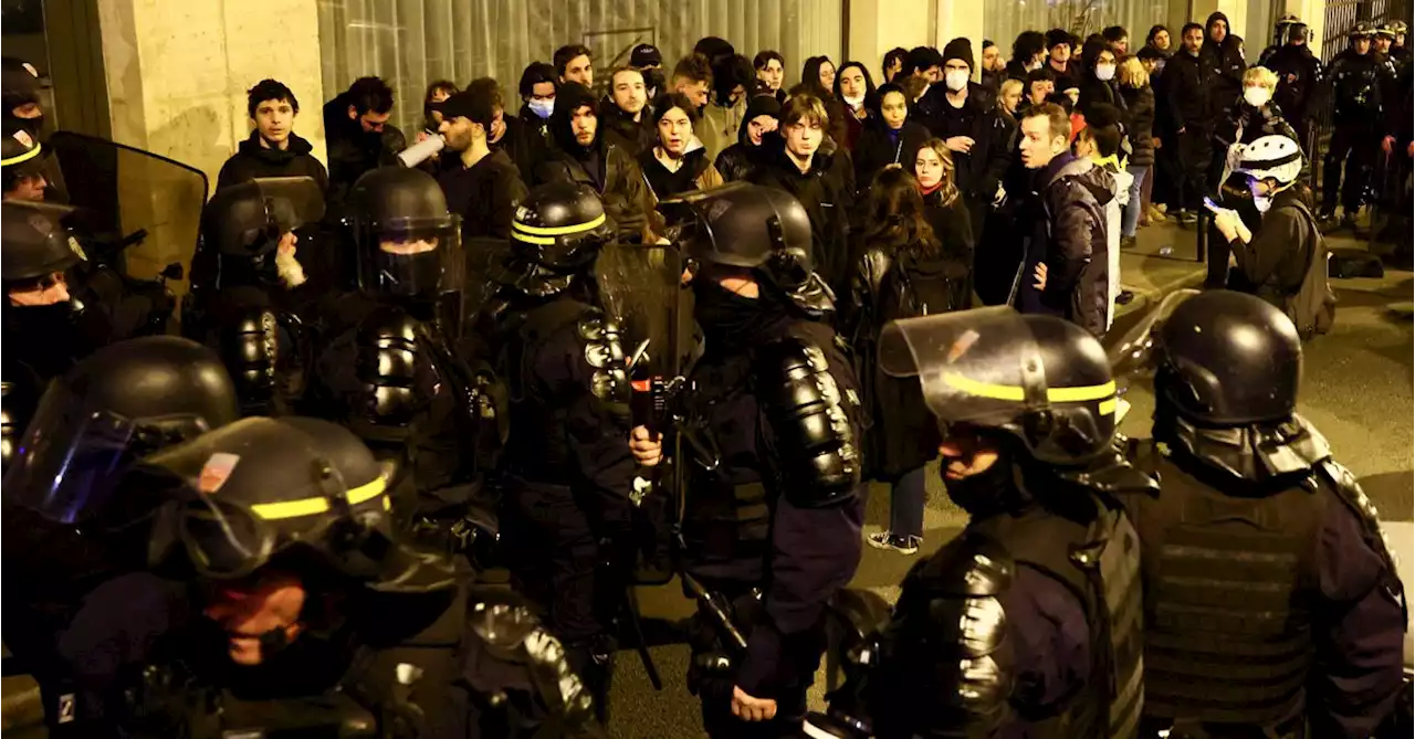 Dozens arrested in French protests after government survives no-confidence vote