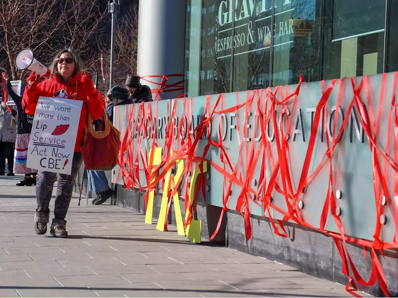 Bell: Danielle Smith stickhandles around Sir John A. Macdonald