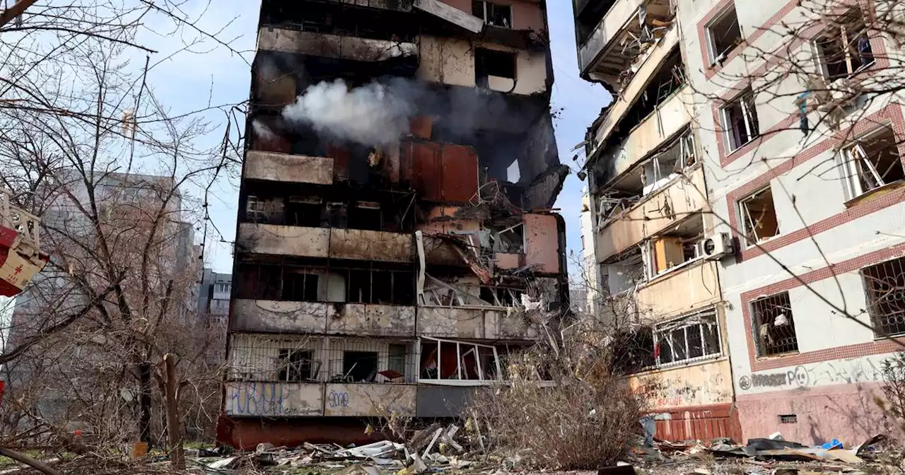 Ukraine says Russian missiles and drone attacks killed civilians in apartments and a dorm