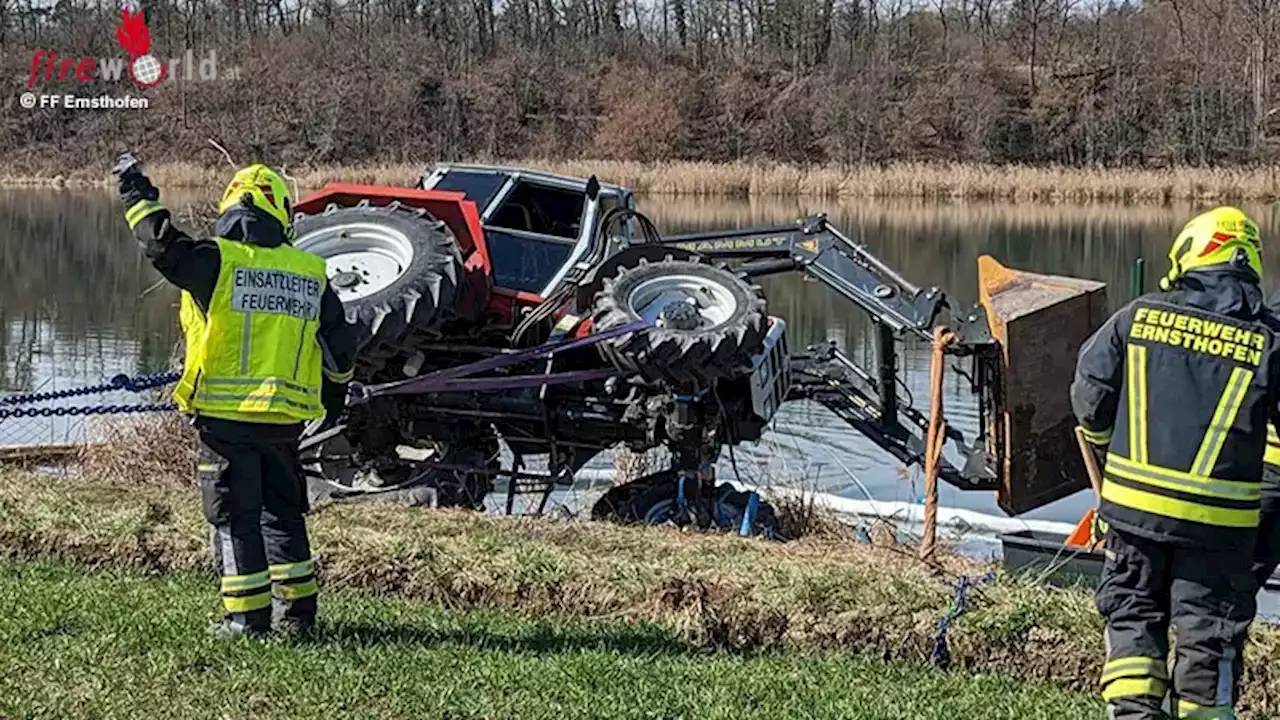 Nö: Traktor kippt um und landet im Flussbett → Fahrer kann sich retten