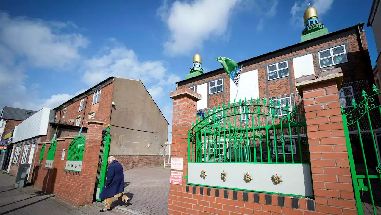 Man arrested for attempted murder after two men set on fire outside mosques