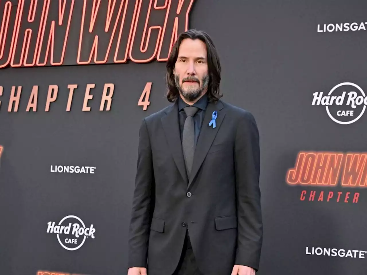 Keanu Reeves: ‘It “f----- sucks Lance Reddick isn’t here’