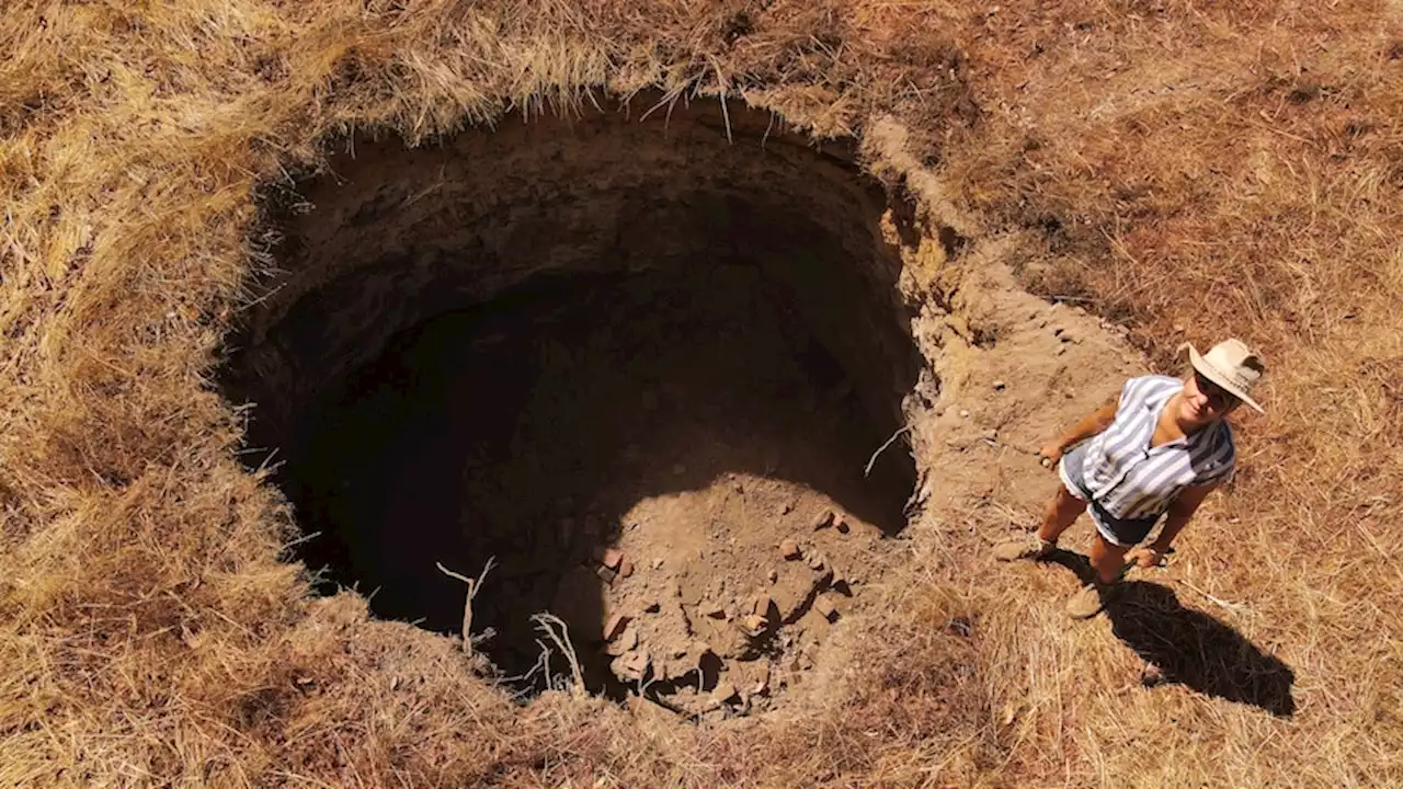 Pia thought she'd purchased her dream property — then a 10m sinkhole opened up on her land