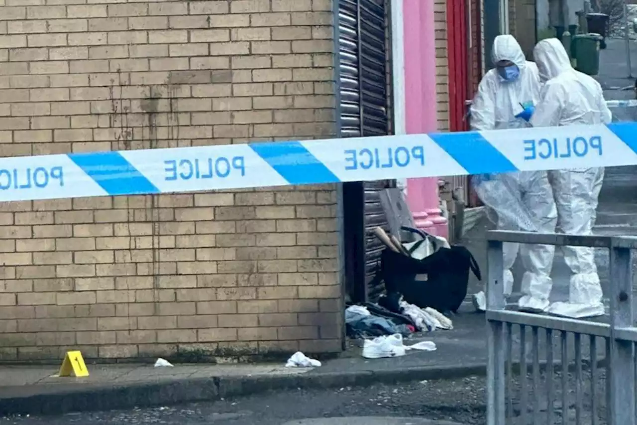 Forensics officers lock down scene after man rushed to hospital