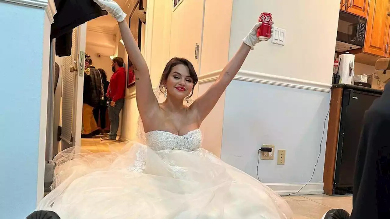 Why is Selena Gomez wearing a wedding dress in her latest Instagram post?