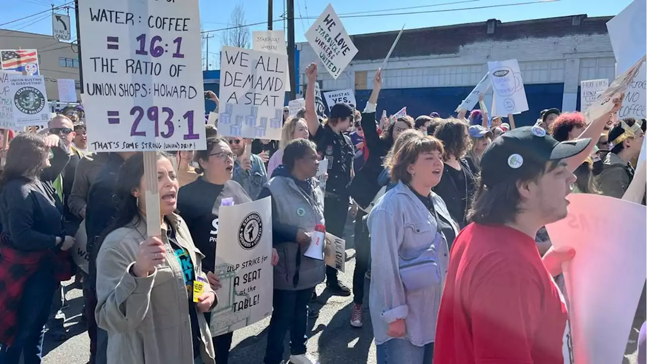 Starbucks workers hold protest outside Seattle HQ to demand livable wages