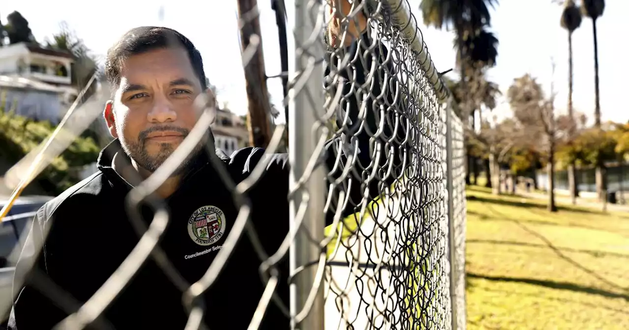 The fence around Echo Park Lake is coming down. The debate over it rages on