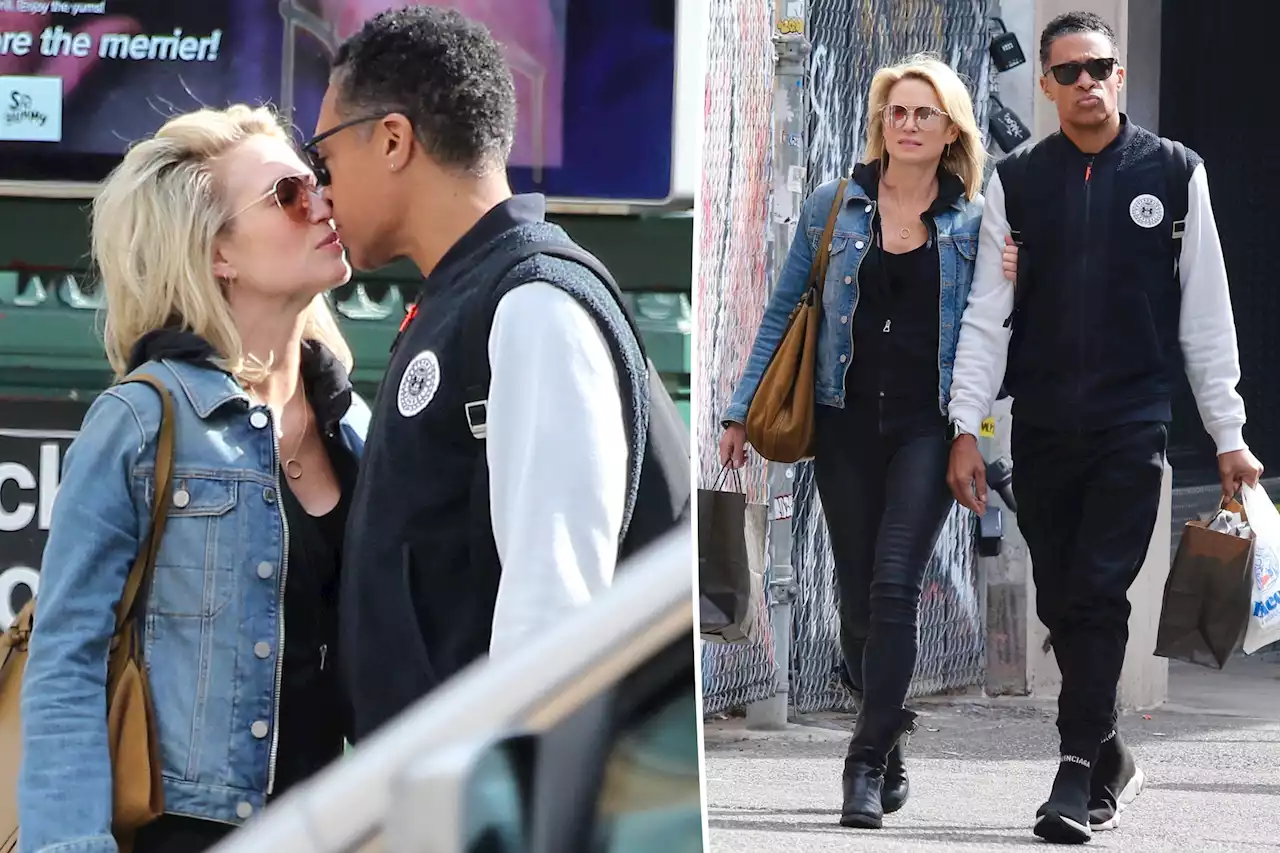 Amy Robach keeps close hold on T.J. Holmes during PDA-filled errands run