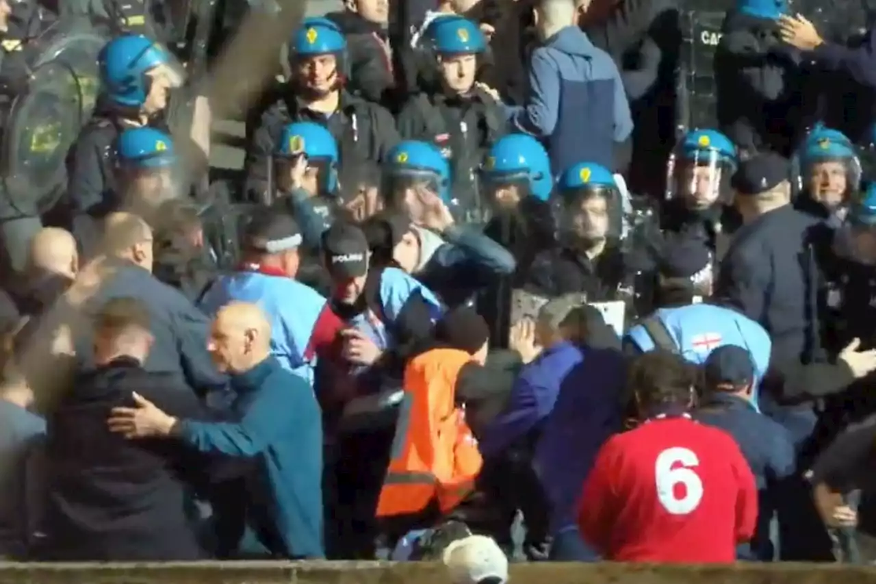 Tensions flare at Italy vs England as riot cops hit 3 Lions fans with batons