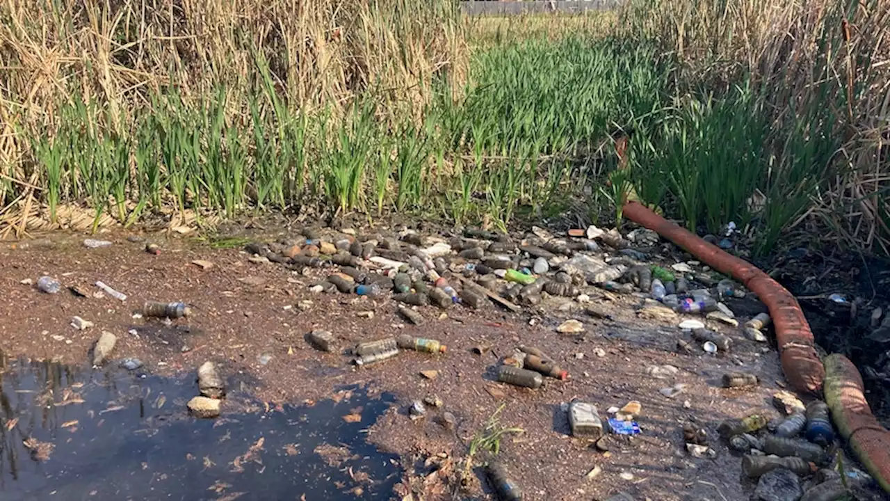 As firefighters put out a large factory fire, a massive effort to stop plastic going into waterways began