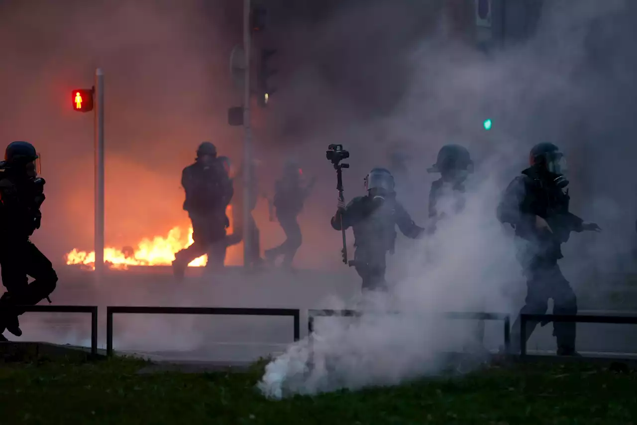 Macron faces 800,000-person protest in Paris over pension reform