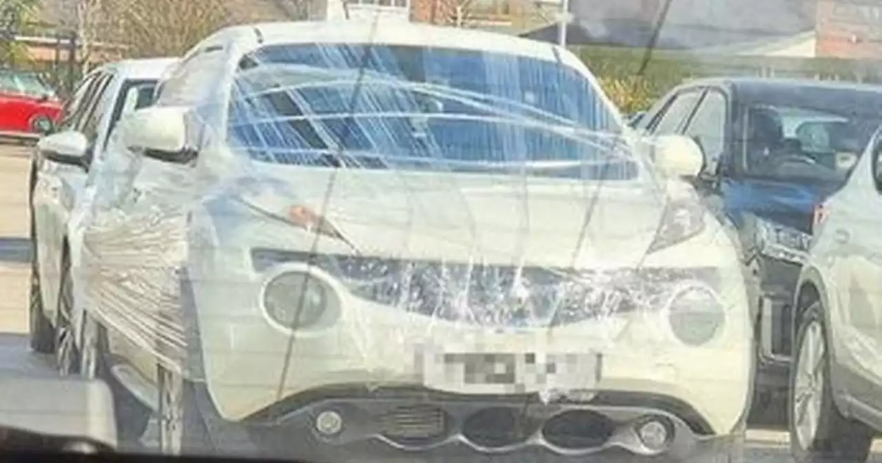 Aldi staff say there's a good reason dad discovered car wrapped in cling film