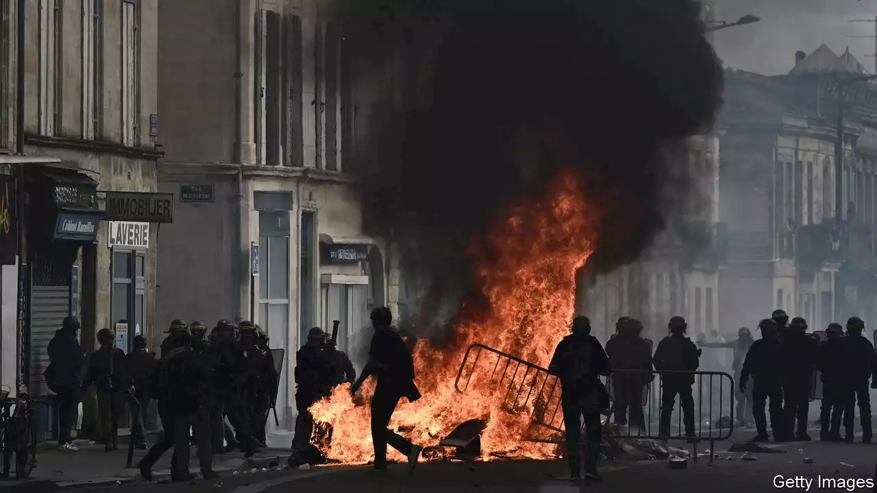 Protests against Emmanuel Macron’s pension reform turn violent