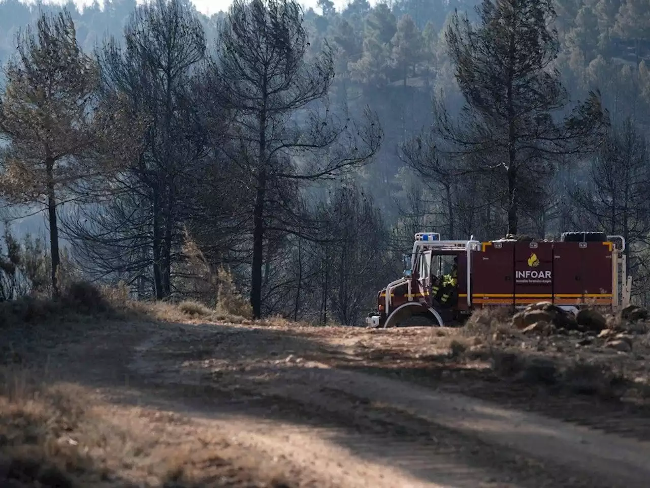 Spain firefighters working to control blaze that has destroyed 4,000 hectares