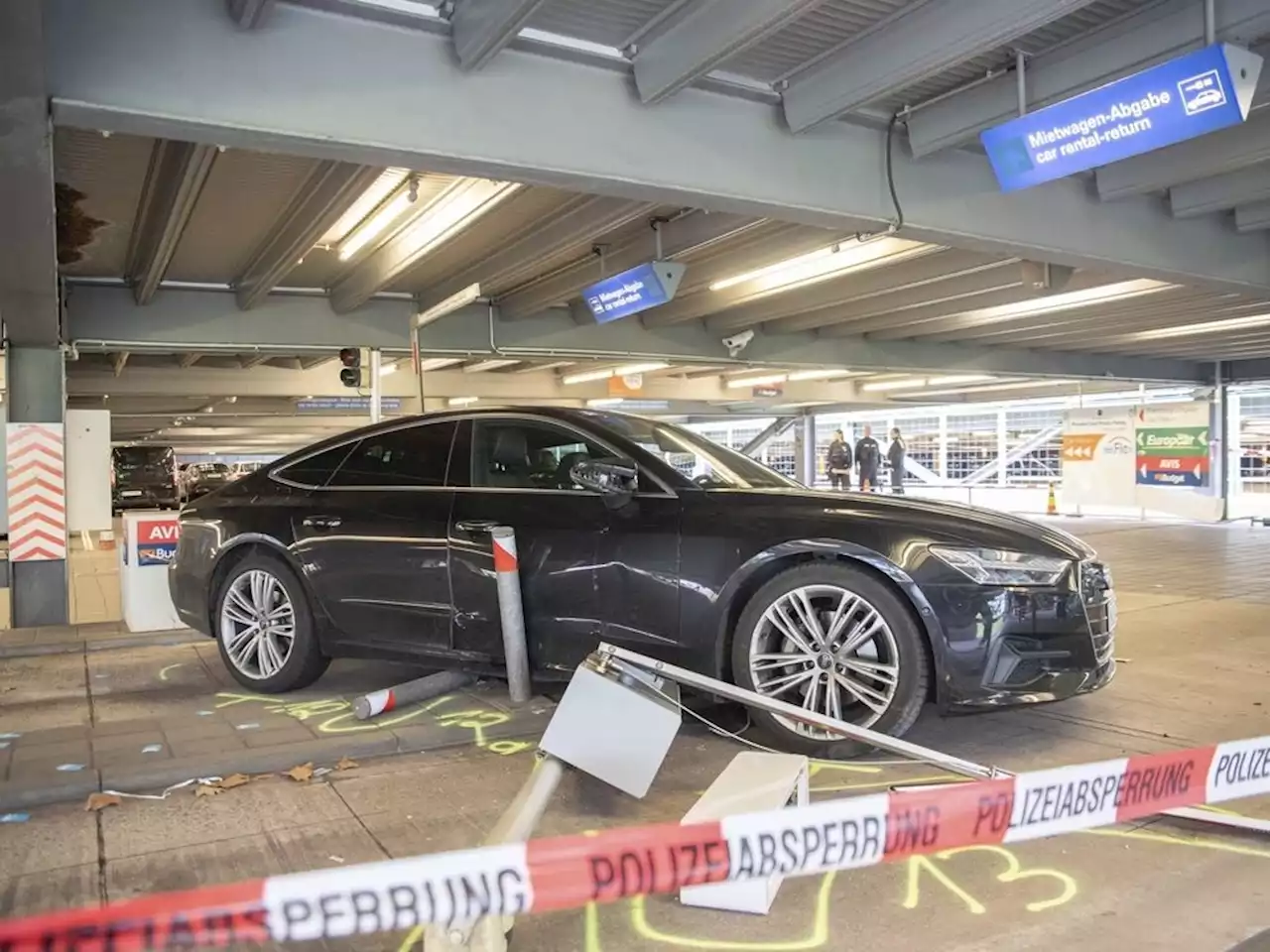 Man drives at pedestrians inside German airport garage