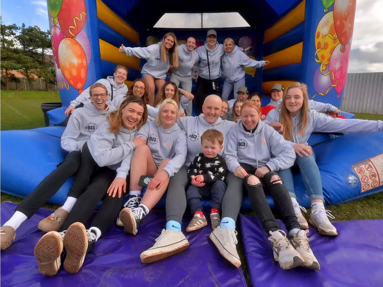 Family, friends and footballers come together in fundraiser for mum facing cancer