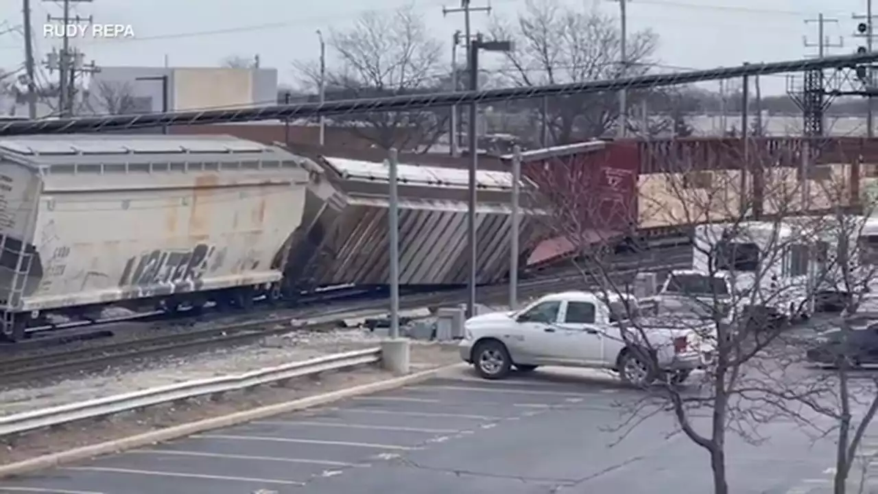 Train derailment: 2 freight train cars seen tipping off tracks in Franklin Park | VIDEO