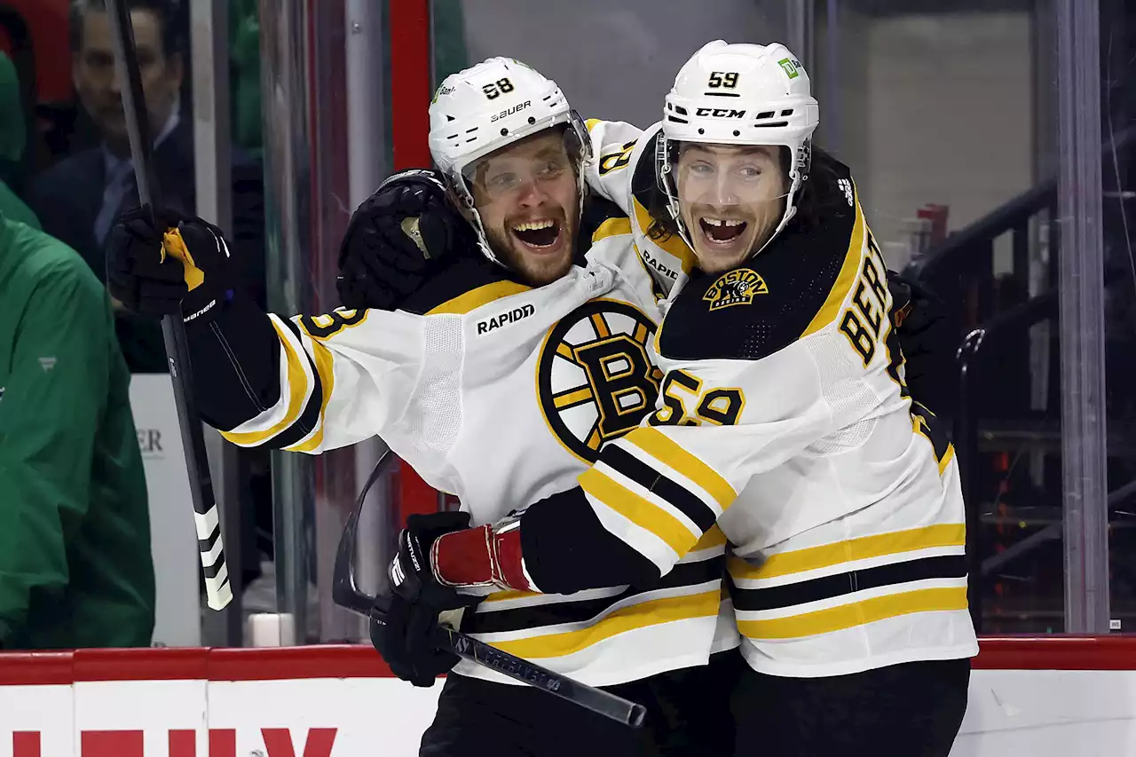 Pastrnak hits 50-goal mark as Bruins top Canes in shootout