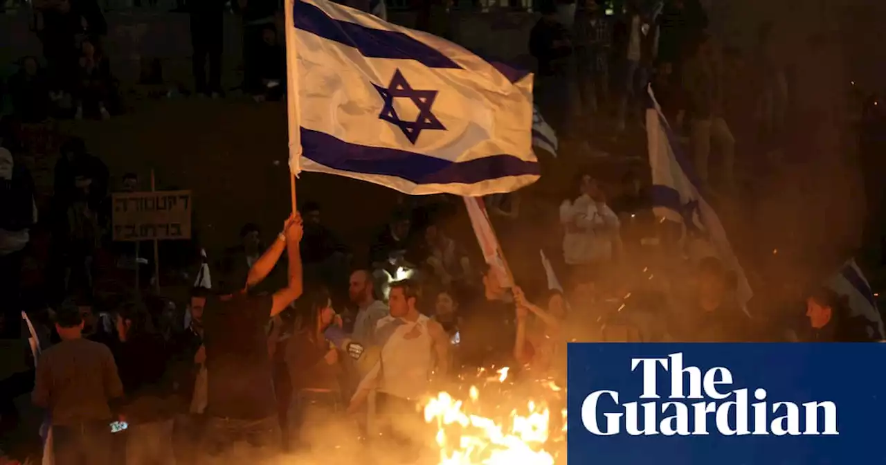 Israel’s president calls for halt to judicial overhaul after mass protests