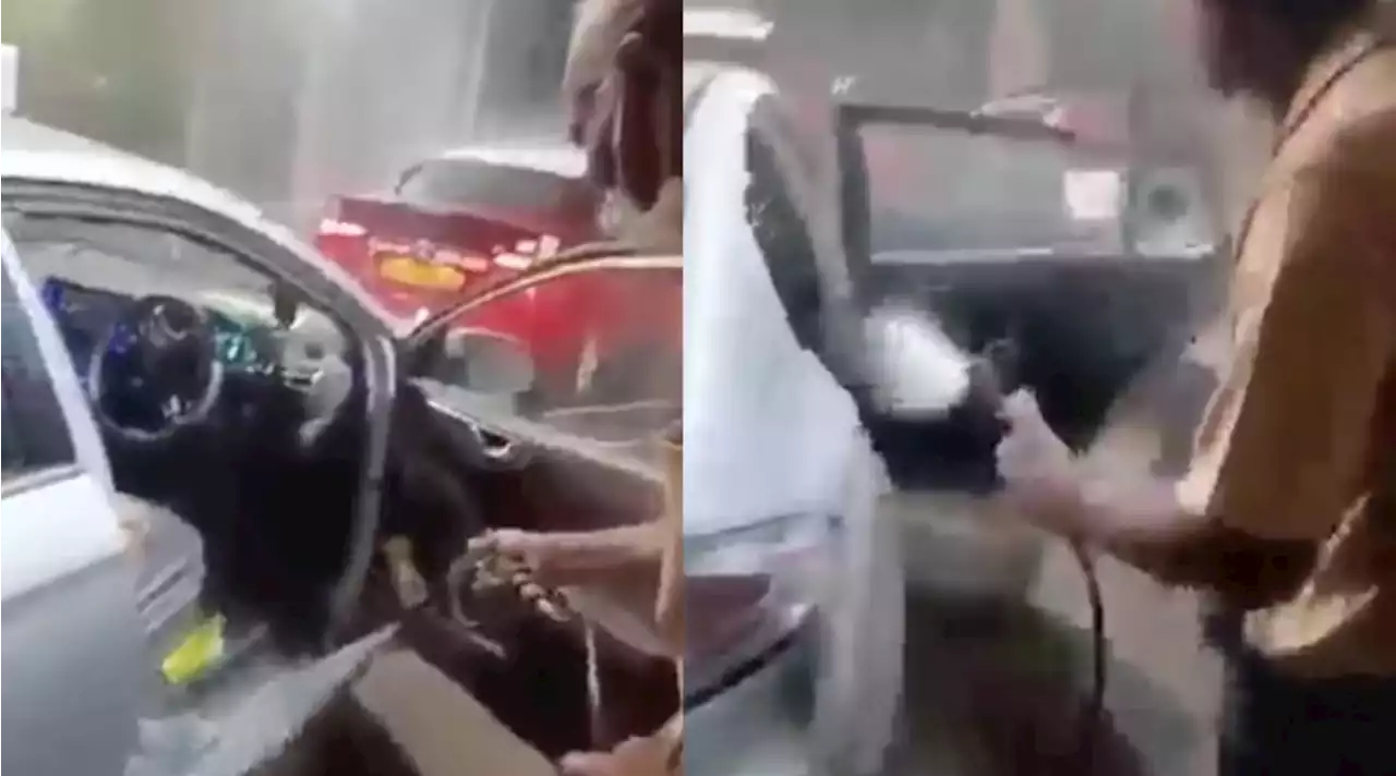 Viral video of taxi driver washing the interior of Silvercab bewilders netizens - Singapore News