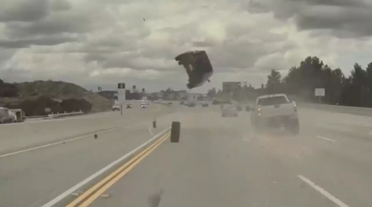 Viral video shows vehicle fly into the air on Los Angeles freeway after colliding with loose tire