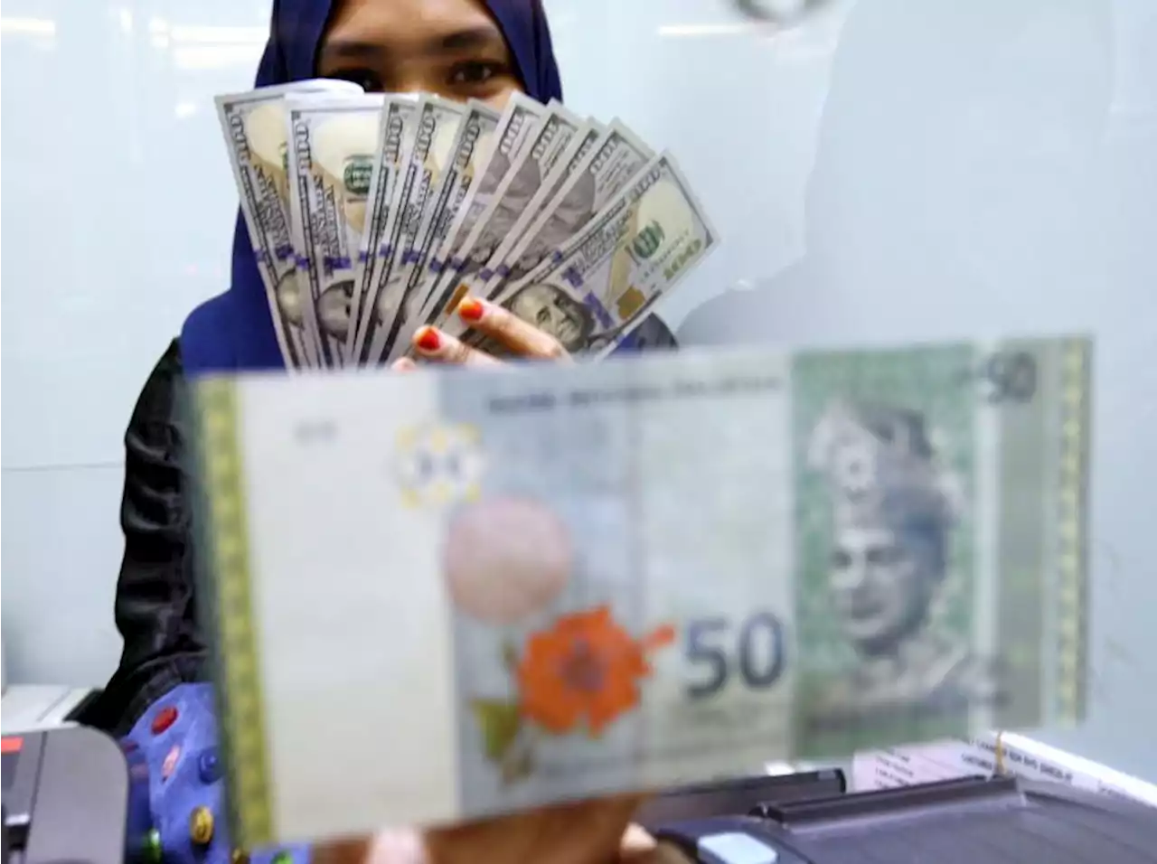 Ringgit ends higher against US dollar in muted trading