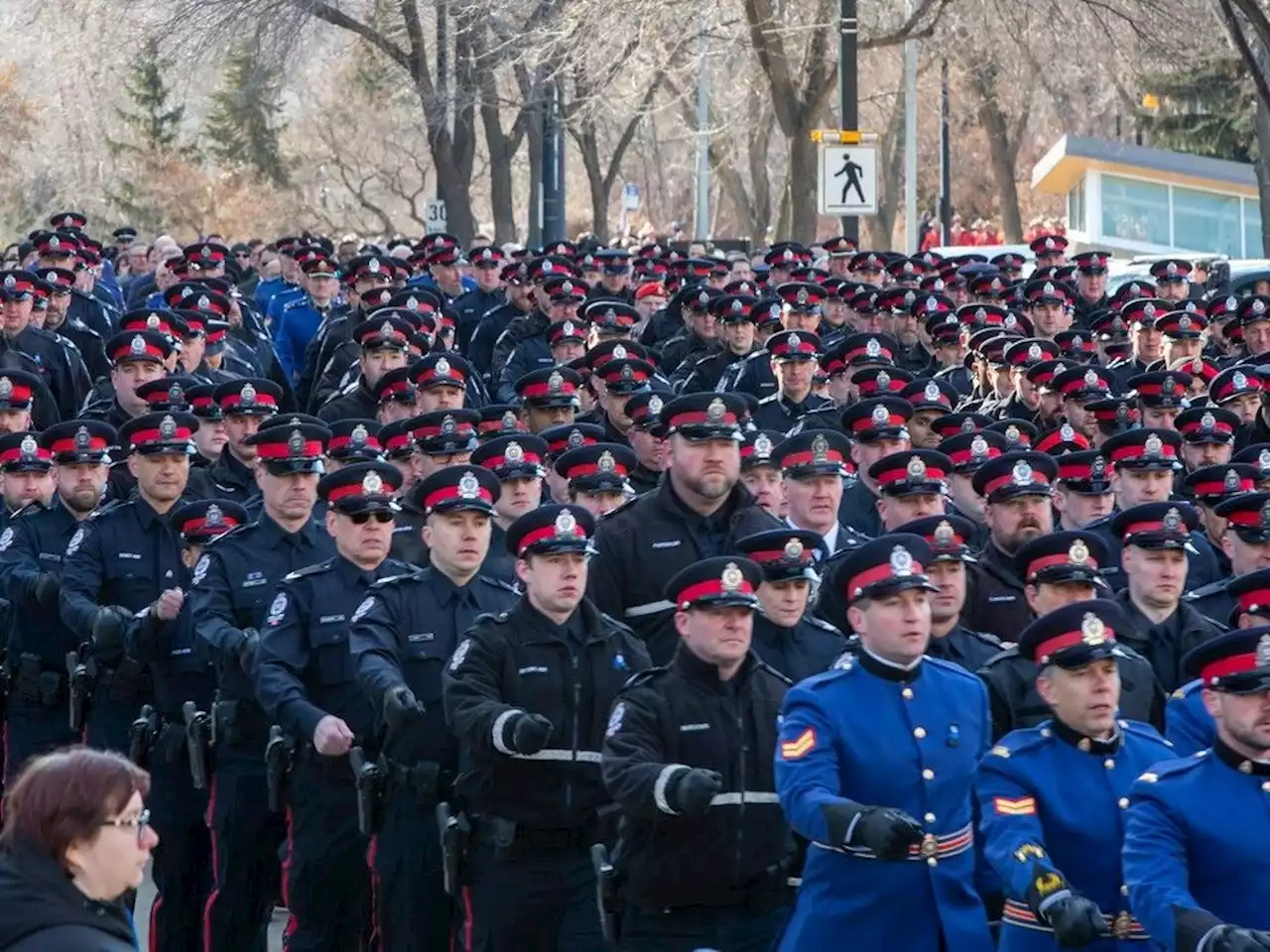 Photos: Procession winds through Downtown Edmonton for fallen EPS officers