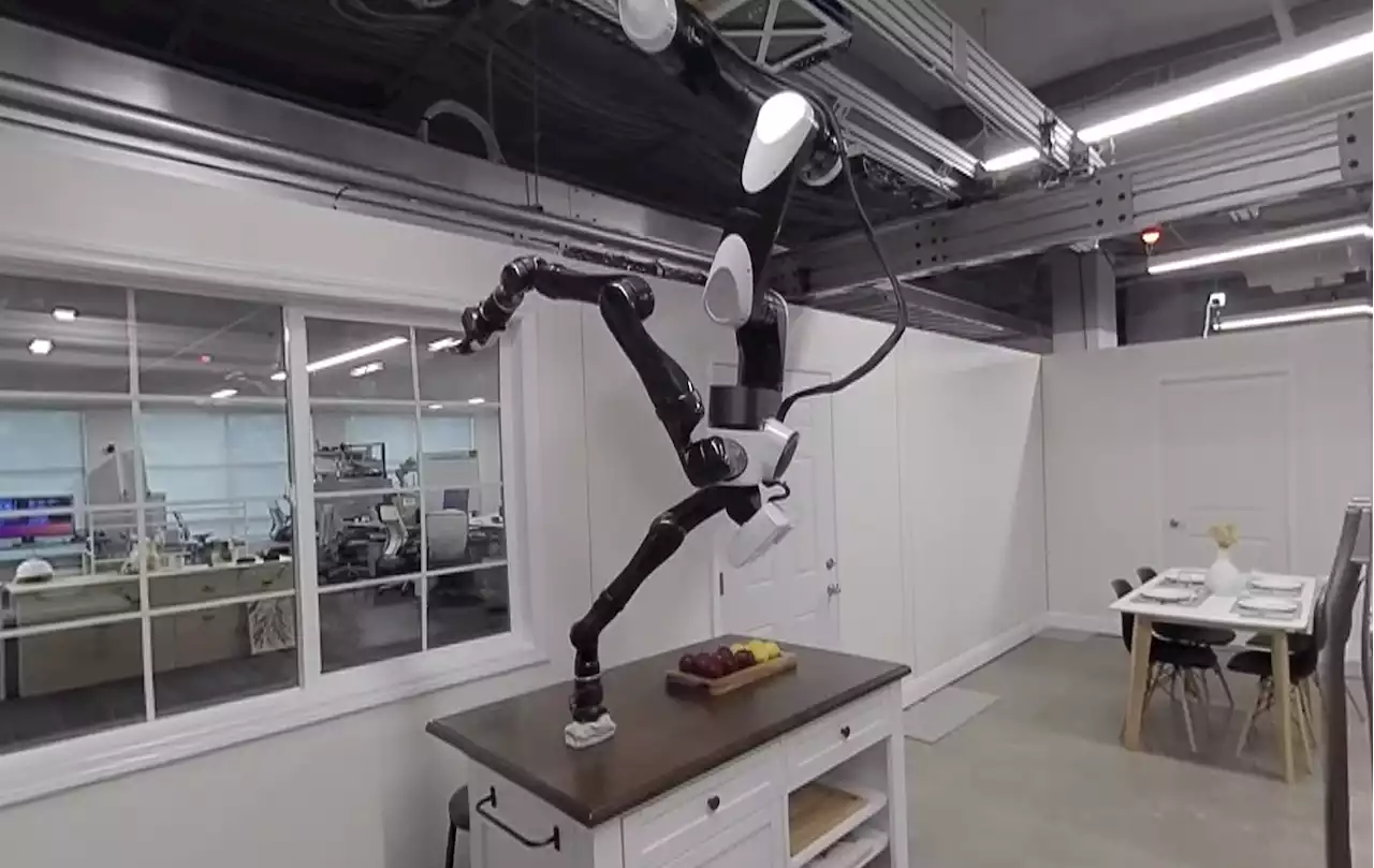 Toyota’s robotic butler will serve you from the ceiling