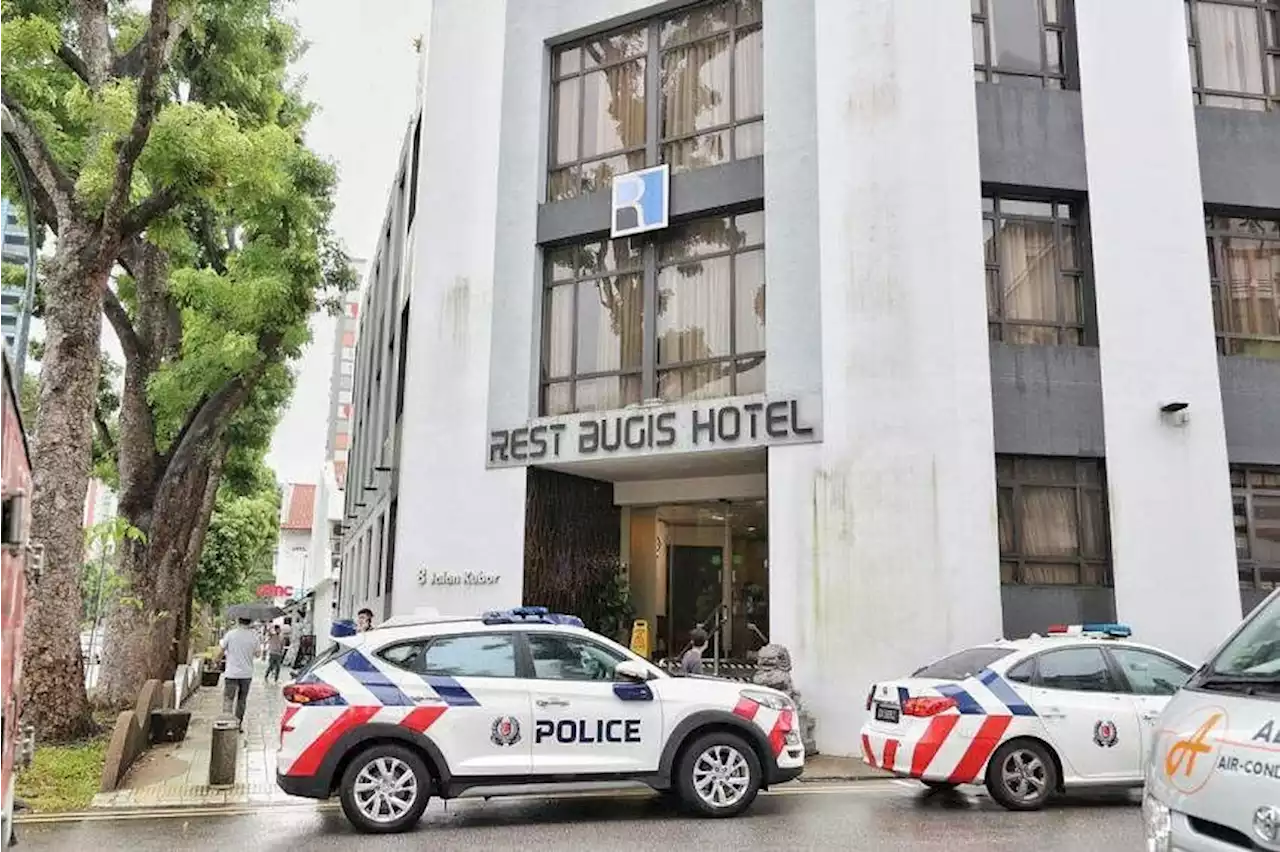 5 arrested after woman found with injuries in Bugis hotel; two weapons found