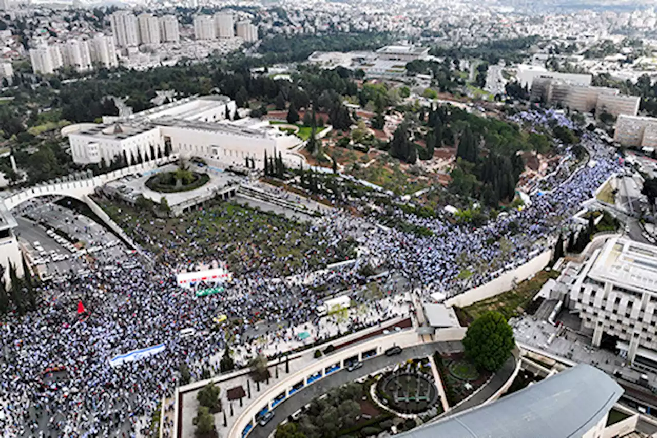 Netanyahu delays judicial overhaul after mass protests | Josef Federman & Ilan Ben Zion / The Associated Press