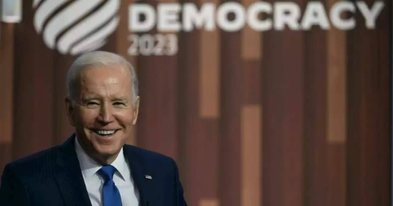 Biden, seeing 'turning point' for democracy, offers funding push at summit