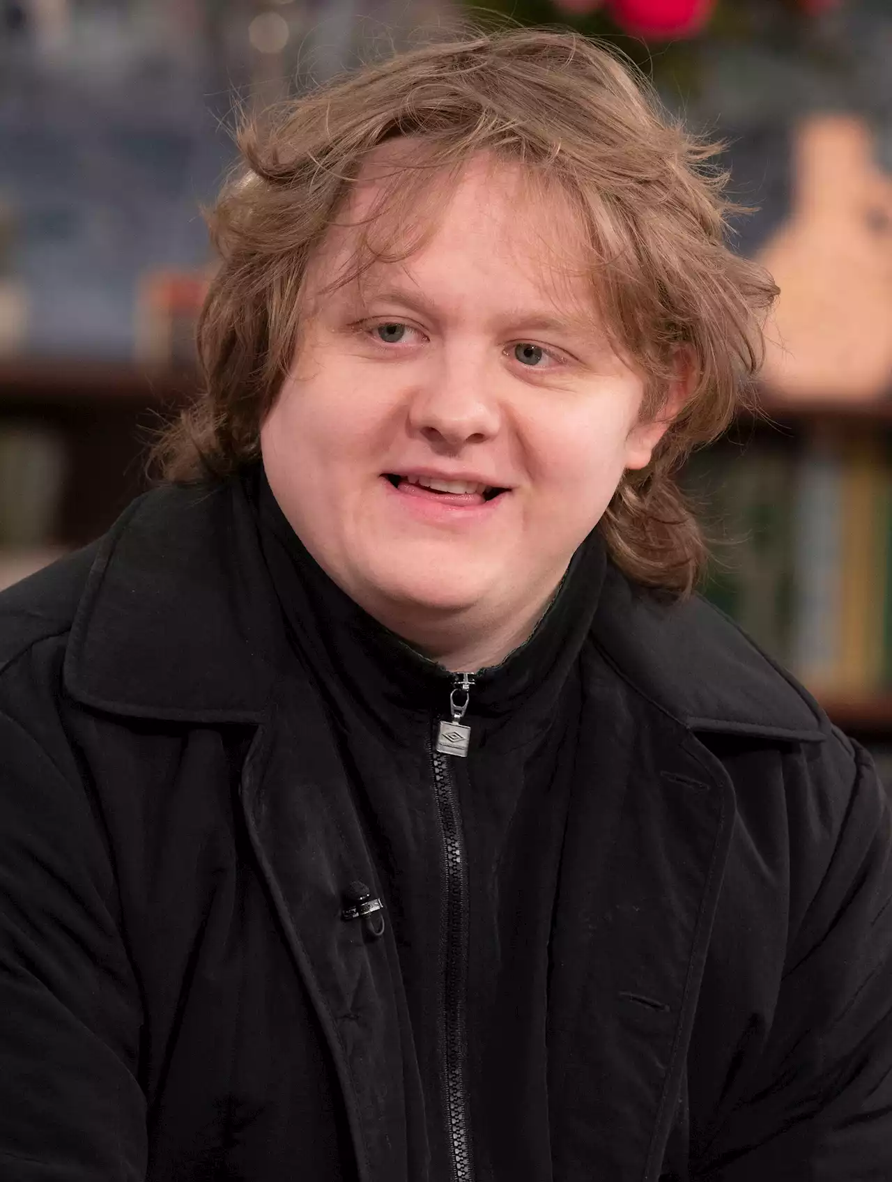 Netflix Brilliantly Trolls Lewis Capaldi In Ads For His New Doc With Old Pics Of ‘Lookalike’ Liz Truss