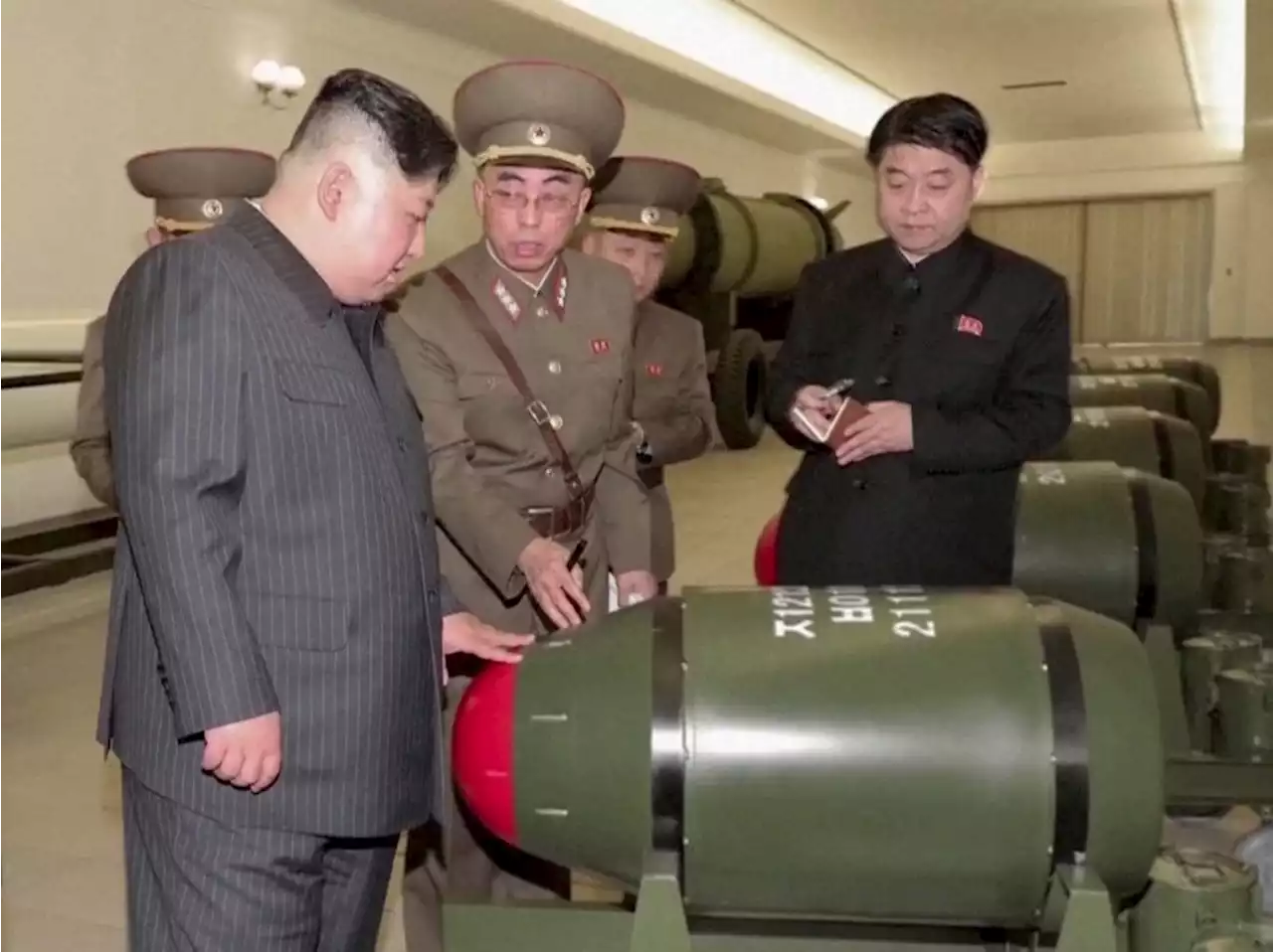 North Korean leader's rare display of nuclear warheads sends chilling message