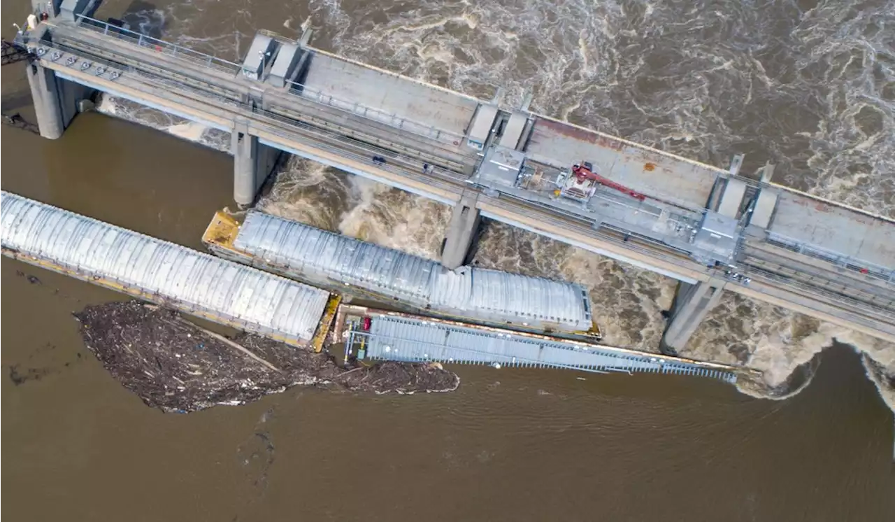 Collision at canal entrance detaches barges, closing locks and dam on Ohio River