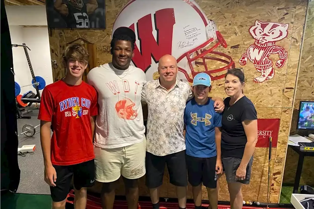 NFL D-line draft prospect Keeanu Benton and his Wisconsin high school wrestling coach are bonded for life