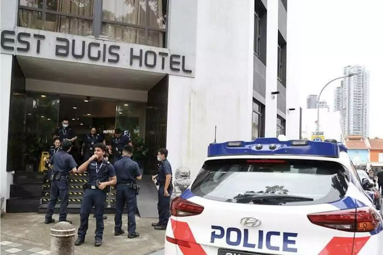 Third person charged over attack at Bugis hotel; he had warrant of arrest against him