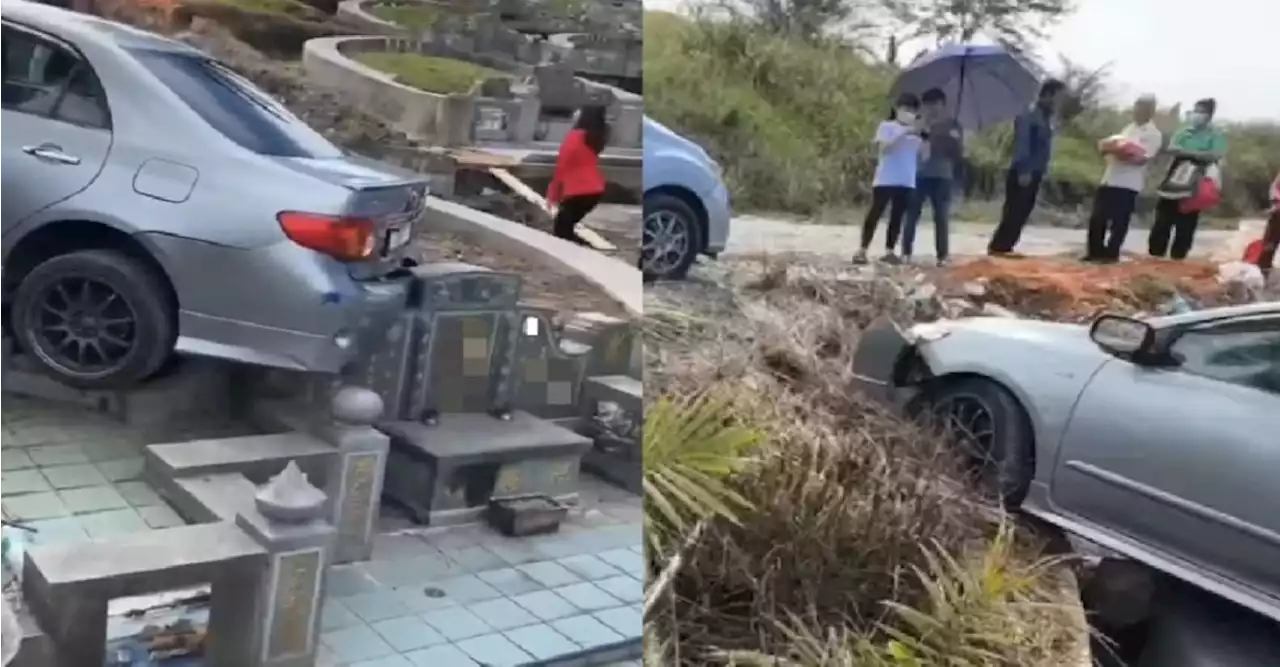 Grave mistake: Malaysian man drives his car straight into tombstone