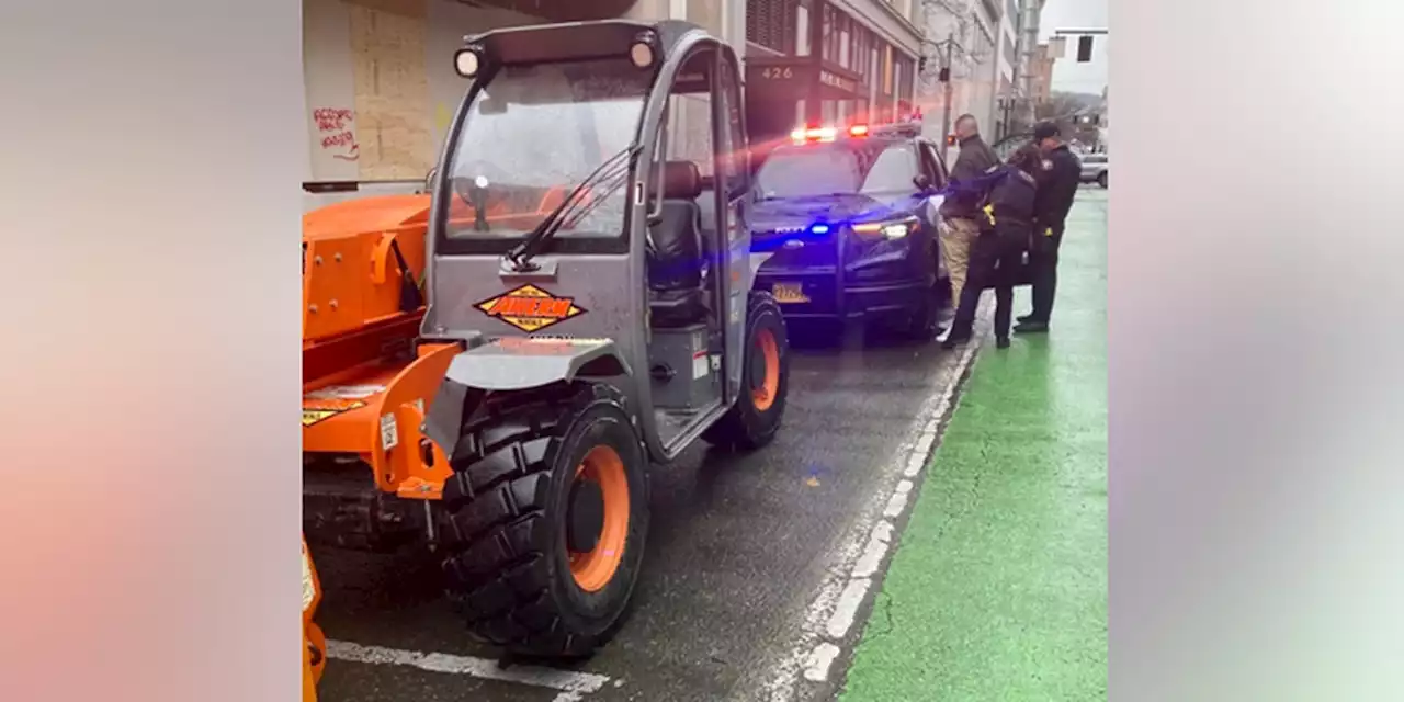 Police: Man arrested after chasing pedestrians in stolen forklift