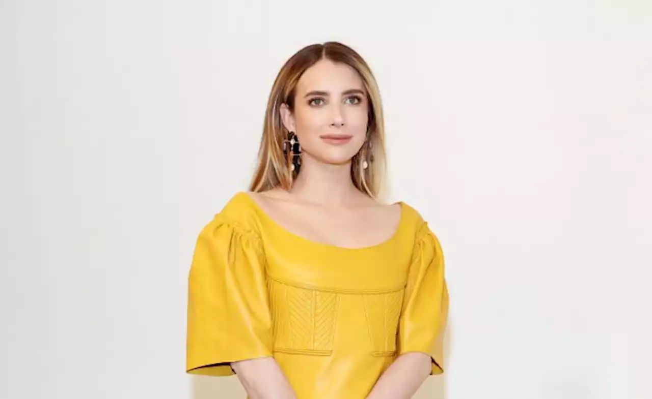 Emma Roberts Brightens Chloé’s Fall 2023 Paris Fashion Week Show in Yellow Leather Dress