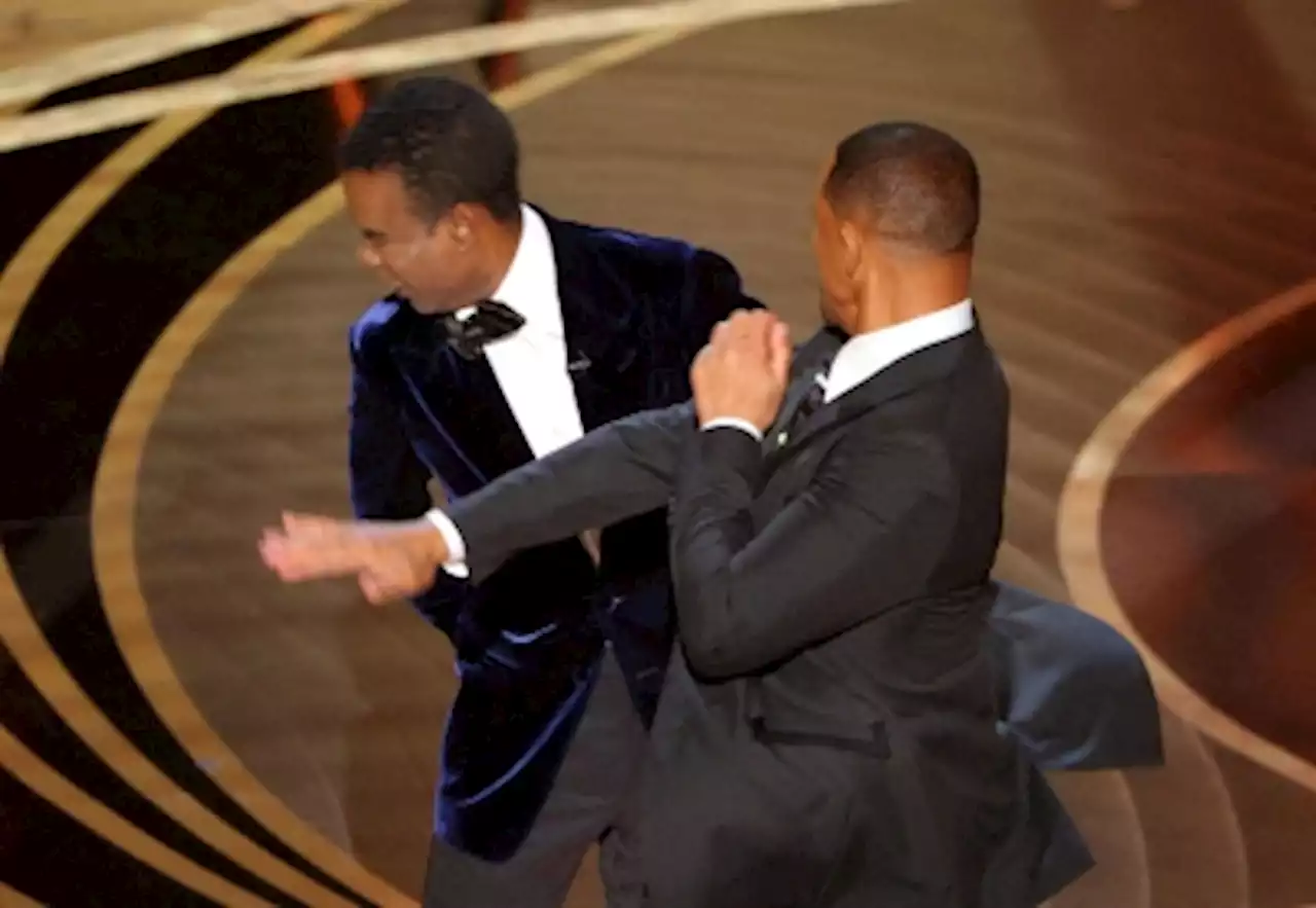 Chris Rock hits back at Will Smith in Netflix livestream, a year after Oscars slap