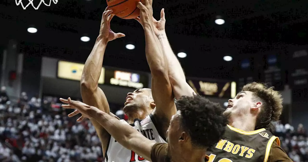 Aztecs handle Wyoming, clinch outright Mountain West title, cut down nets