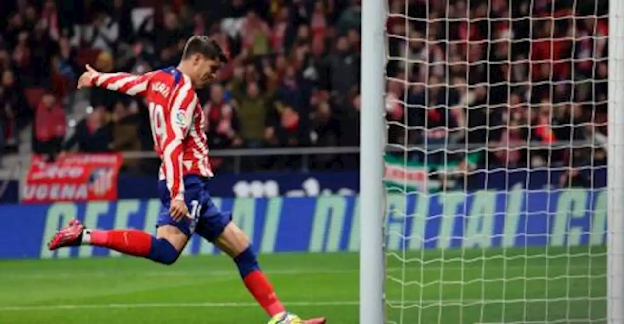 Atletico thrash Sevilla, celebrate Simeone record in style