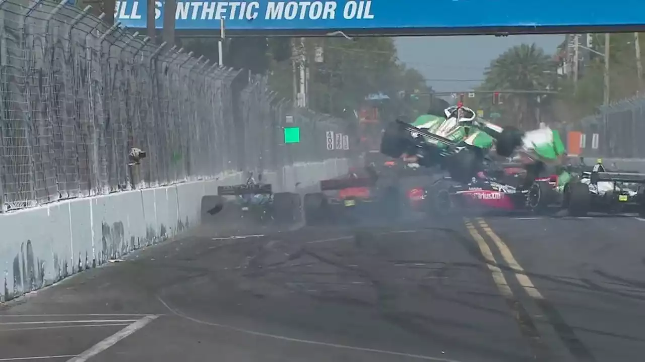 Car goes airborne in wild wreck on first lap of IndyCar Series season