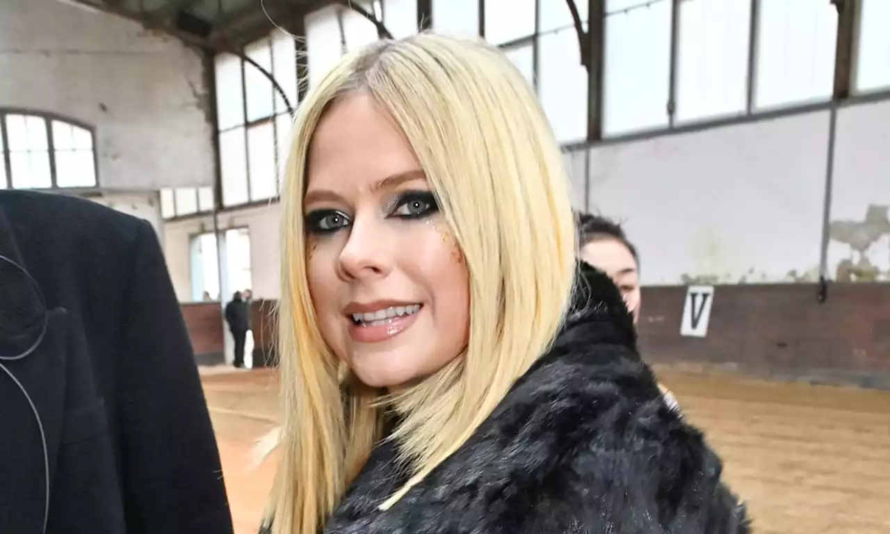 Newly single Avril Lavigne puts on show-stopping display in knee-high boots