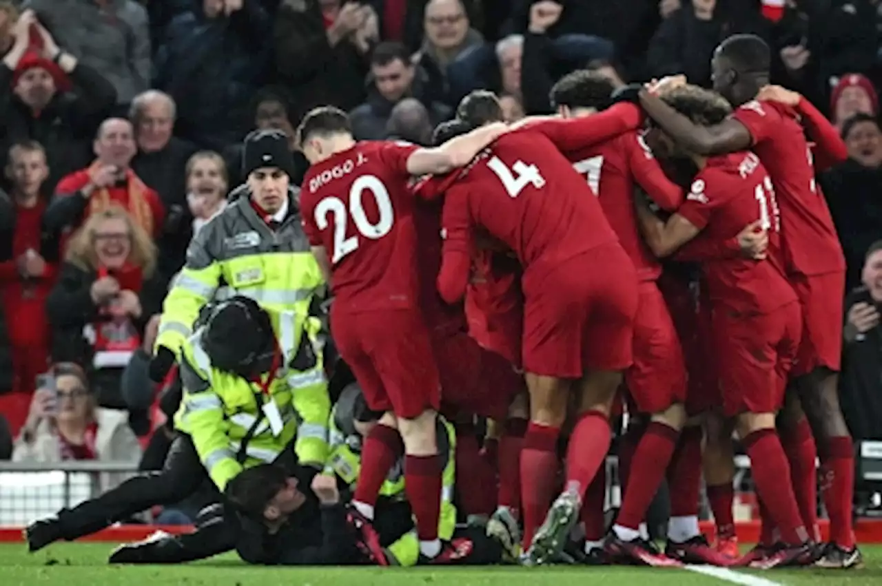 Liverpool to ban pitch invader who nearly injured Robertson