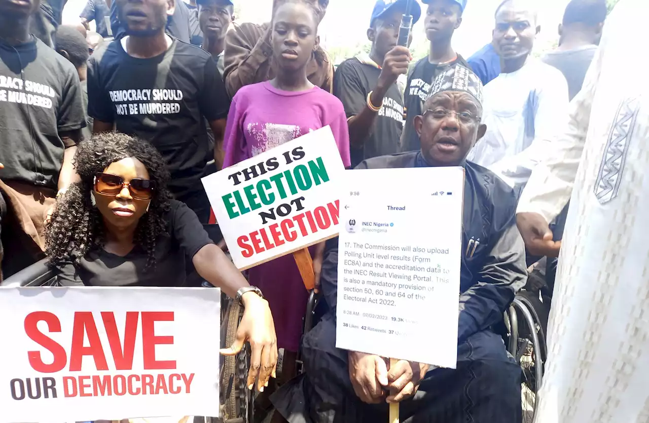 PICTORIAL: Atiku, PDP supporters lay siege on INEC Office, demand to see INEC representative